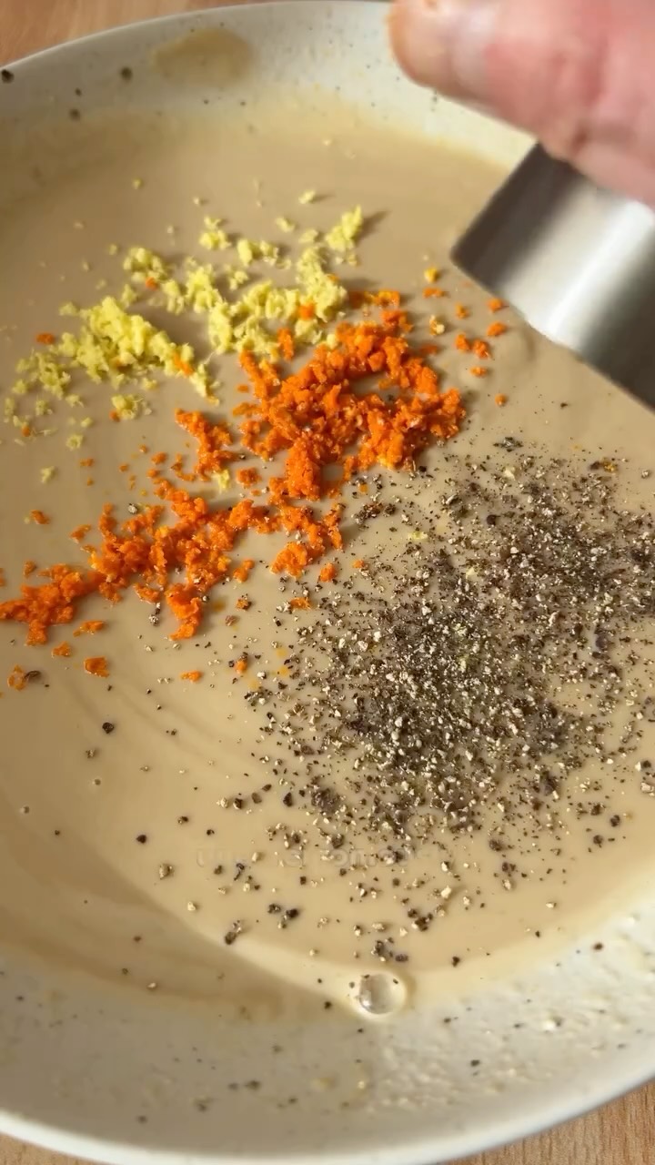 DAY 13 of the 24 DAYS OF DRESSING: 
Turmeric Ginger Tahini Dressing (recipe below) 
Also, comment BOOK for a chance to win one of the 24 free copies of my cookbook, titled Salad Whisperer. 

Every comment is an entry and you can enter as many times as you like! Good luck!

Broccoli and Carrot Slaw with Salmon, Lentils, and Turmeric Ginger Tahini Dressing

(Serves 3–4)
3 cups broccoli stems, shredded or julienned 
3 cups carrots, shredded or julienned
1½ cups cooked lentils (I prefer black or French lentils), cooled at least to room temperature
2 scallions, sliced
12 oz. grilled or seared salmon
2 avocados, sliced
½ cup roasted cashews

In a large bowl, combine the broccoli, carrots, lentils, scallions, and approximately ¾ cup dressing. Season the slaw to taste with kosher salt, adding more dressing if desired. Top with the salmon, sliced avocado, and roasted cashews. Pass around the extra dressing

Turmeric Ginger Tahini Dressing
3 tbsp sweet white miso paste
3 tbsp seasoned rice wine vinegar (or plain rice wine vinegar and 3 tsp honey)
3/4 cup tahini
Room-temperature water (about ½–¾ cup)
2 tsp grated ginger
2 tsp grated turmeric
¼–½ tsp black pepper

In a small bowl, whisk together the vinegar and miso until the miso dissolves. Add the tahini and whisk to combine. Add the water, a few tablespoons at a time, whisking to reach a consistency that is a little thicker than heavy cream. Add the ginger, turmeric, and black pepper.
#recipeadventcalendar #thesaladwhisperer