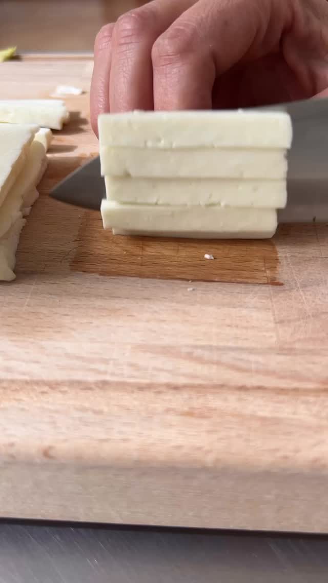 Red Cabbage Fennel and Apple Salad with Walnuts and Halloumi and Cider Vinaigrette

6 cups shredded red cabbage
1 fennel bulb, thinly sliced
1 apple julienned, (if doing this in advance, soak apples in 1 pint water with one lemon squeezed into it so apples don’t turn brown)
1/2 cup toasted walnuts 
4 oz. Halloumi, julienned
1 tbsp olive oil

Cider Vinaigrette:
1 tbsp Dijon mustard 1 1/2 tbsp honey 1/4 cup Apple Cider Vinegar  1/2 cup olive oil Kosher salt freshly cracked black pepper

Prepare dressing by whisking together the honey, Dijon mustard and  vinegar until fully dissolved.  Drizzle in the olive oil slowly and incrementally (it’s okay to put the bottle down), integrating all of the oil into the vinegar mixture before adding more oil.  Season to taste. Pat the halloumi completely dry with paper towels. Heat your stainless steel pan over medium heat. Use a thin but even layer of oil. Add the halloumi and let it sit undisturbed for 1–2 minutes. It will naturally release once a golden crust forms. Flip once, brown the other side, and remove. It’ll crisp beautifully if you let it release on its own. Combine the shredded cabbage, fennel, apple and a few tbsp of dressing. Season to taste and add more dressing as desired. Top salad with walnuts and halloumi.