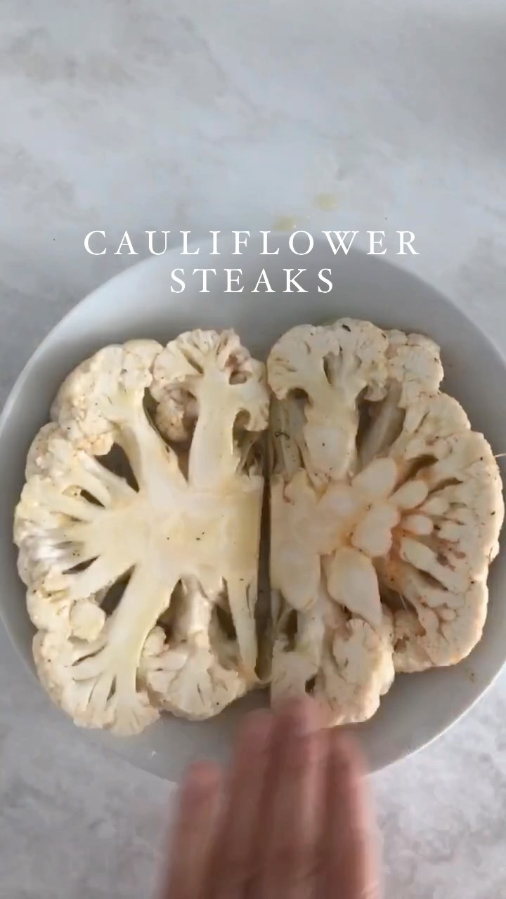 You guys know I love a cauliflower steak! They are so versatile, substantial, and of course, delicious! These recipes can be found in my reels, but please DM if you need help locating them. 

Here is my go to method for the best Cauliflower Steaks

Cauliflower Steaks
(Makes 2)

1 medium head cauliflower
2 tbsp olive oil
2 tbsp grated Parmesan
1/2 tsp seasoned salt

Place small sheet pan on middle rack in oven and preheat to 500 degrees. Slice base off cauliflower and cut away any pieces that aren’t connected to stem end (save for roasting another day). Slice remaining slab of cauliflower into 2, 1 inch thick slabs. Rub olive oil onto cut sides and sprinkle with seasoned salt and Parmesan. 

Once oven is preheated, carefully remove pan and place cauliflower onto pan. Place pan back in oven. Cook cauliflower steaks for 16 minutes total, flipping once. VERY IMPORTANT STEP: 4 minutes into cook time on each side, carefully crack open oven door just long enough to release any steam that has built up in oven. This ensures that cauliflower steaks cook primarily via searing instead of steaming. 

#cauliflower #cauliflowersteak #cauliflowersteakrecipe #cauliflowerrecipe #thesaladwhisperer