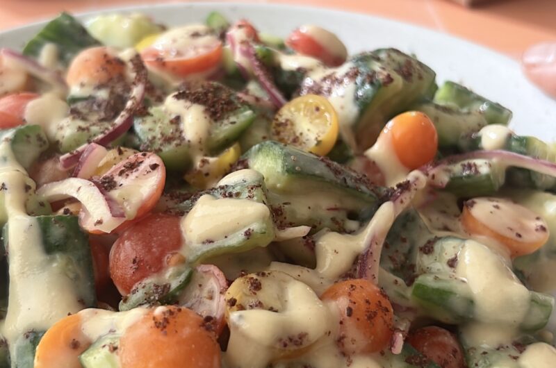 Smashed Cucumber and Tomato Salad with Hummus Dressing