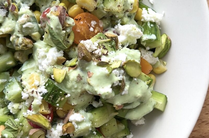 Cucumber Tomato and Corn Salad with Feta Pistachios and Basil Yogurt Dressing