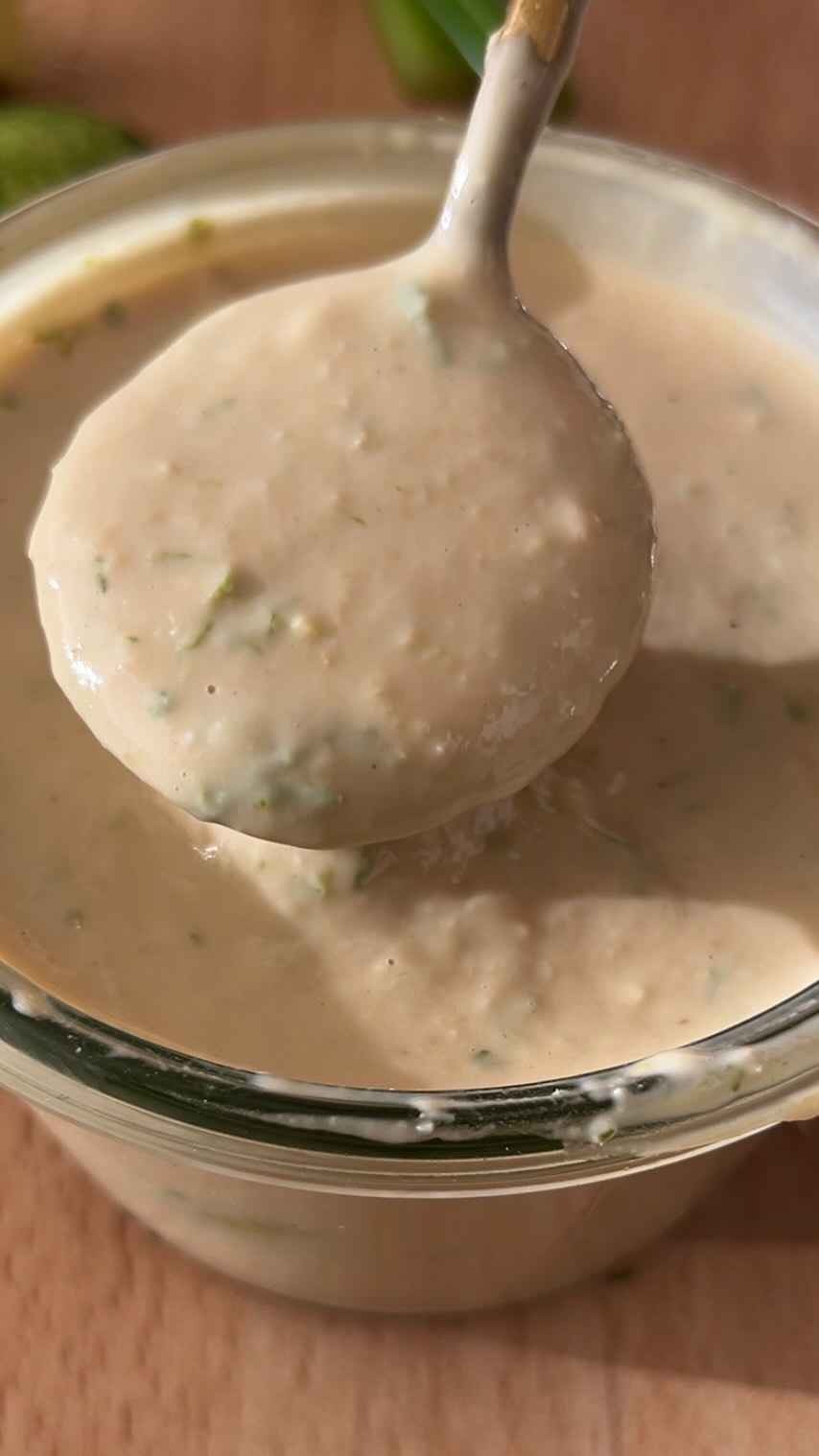 DAY 21 of the 24 DAYS OF DRESSING! GINGER LIME TAHINI DRESSING recipe below! Also, comment BOOK for a chance to win one of the 24 free copies of my cookbook: Salad Whisperer. 

Sweet Potato Edamame and Avocado Salad with Ginger Lime Tahini Dressing in Nori Cups

2 lbs. sweet potatoes
1 1/2-2 tbsp neutral oil
Kosher salt
1 1/2 cups cooked edamame, cold
2 small avocados, diced
2 scallions, sliced
Ginger Lime Tahini Dressing, recipe below
Nori Cups, instructions below
Sesame seeds, for garnish

Prepare a sheet pan with parchment paper and preheat oven to 400° F. Cut sweet potatoes into 1/2 inch dice. Coat sweet potatoes with oil and sprinkle with Kosher salt. Roast until golden brown, about 35 min. Allow to cool to room temperature. 
Combine the roasted sweet potatoes, edamame, avocado and scallion in a large bowl. Dress to your liking and garnish with sesame seeds.

Ginger Lime Tahini Dressing:
3 tbsp sweet white miso paste
3 tbsp rice vinegar
3/4 cup tahini
Room-temperature water (about ½–¾ cup)
2 tsp grated ginger
the zest of one lime
1 tsp toasted sesame oil
In a small bowl, whisk together the vinegar and miso until the miso dissolves. Add the tahini and whisk to combine. Add the water, a few tablespoons at a time, whisking to reach a consistency that is a little thicker than heavy cream. Add the ginger, lime zest and toasted sesame oil. 

For the Nori Cups:You’ll need 2 oz nori (about 48 rectangular sheets) to make 12 cups. Preheat oven to 300°F. Using a clean, food-safe spray bottle, lightly mist both sides of the nori so it softens and molds without cracking. Layer 4 nori rectangles into each well of a mini muffin tin, slightly offsetting them so the nori overhangs the edges of the muffin wells; it will shrink as it bakes. Bake for 12 min.. Let cool in the tin, then gently remove and sprinkle lightly with salt. Use immediately.