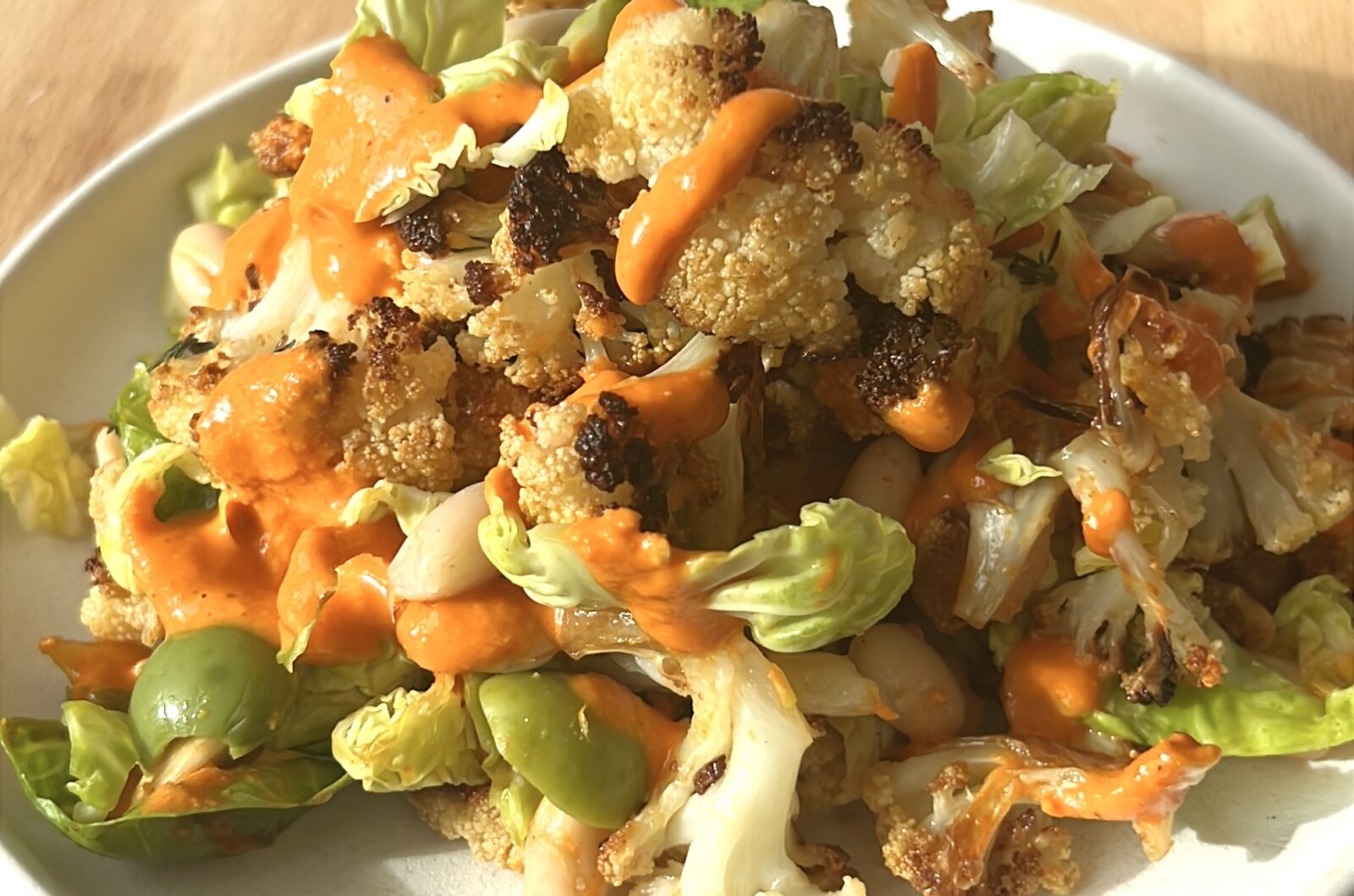 Caramelized Cauliflower Brussels Sprout and White Bean Salad with Romesco-ish Dressing